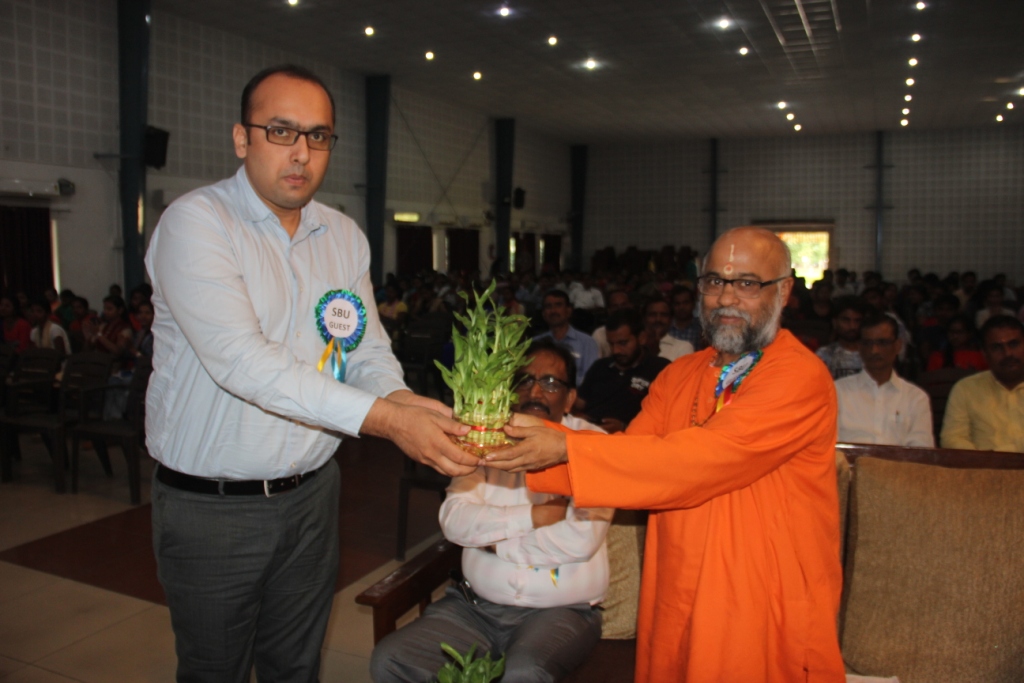 Induction :MR MANISH KUMAR MANAGER P & A  FELICITATING Guest of honor Swami Madhavanand ji